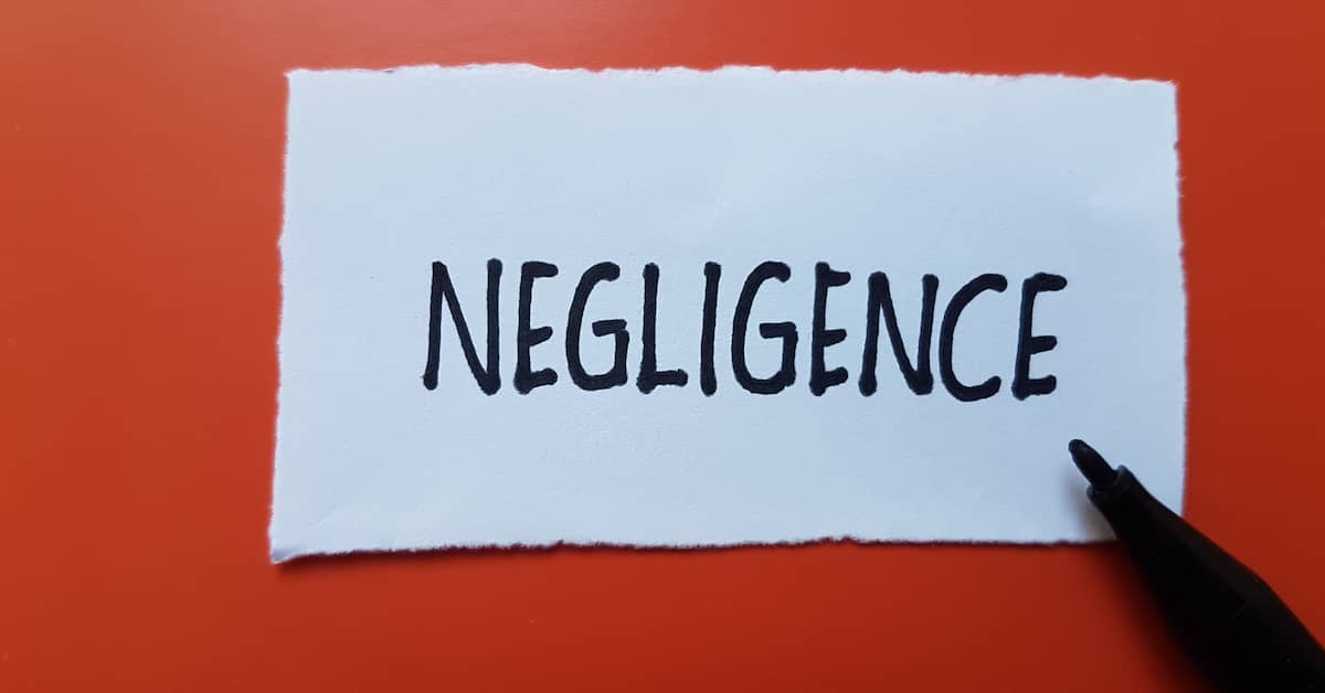 'Negligence' handwritten on slip of paper. | Maggiano, DiGirolamo & Lizzi